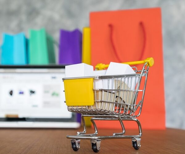laptop and shopping bags, online shopping concept.